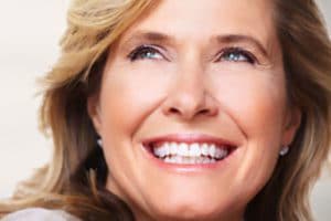 DentalVeneers a wide smiling lady feeling happy after taking our free dental offers in Bethesda