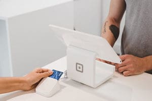 Flexible Payments at Pike District Smiles A customer paying its bill through easy payments method in Pike District Smiles