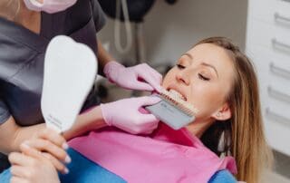 Female undergoing dental veneers treatment.